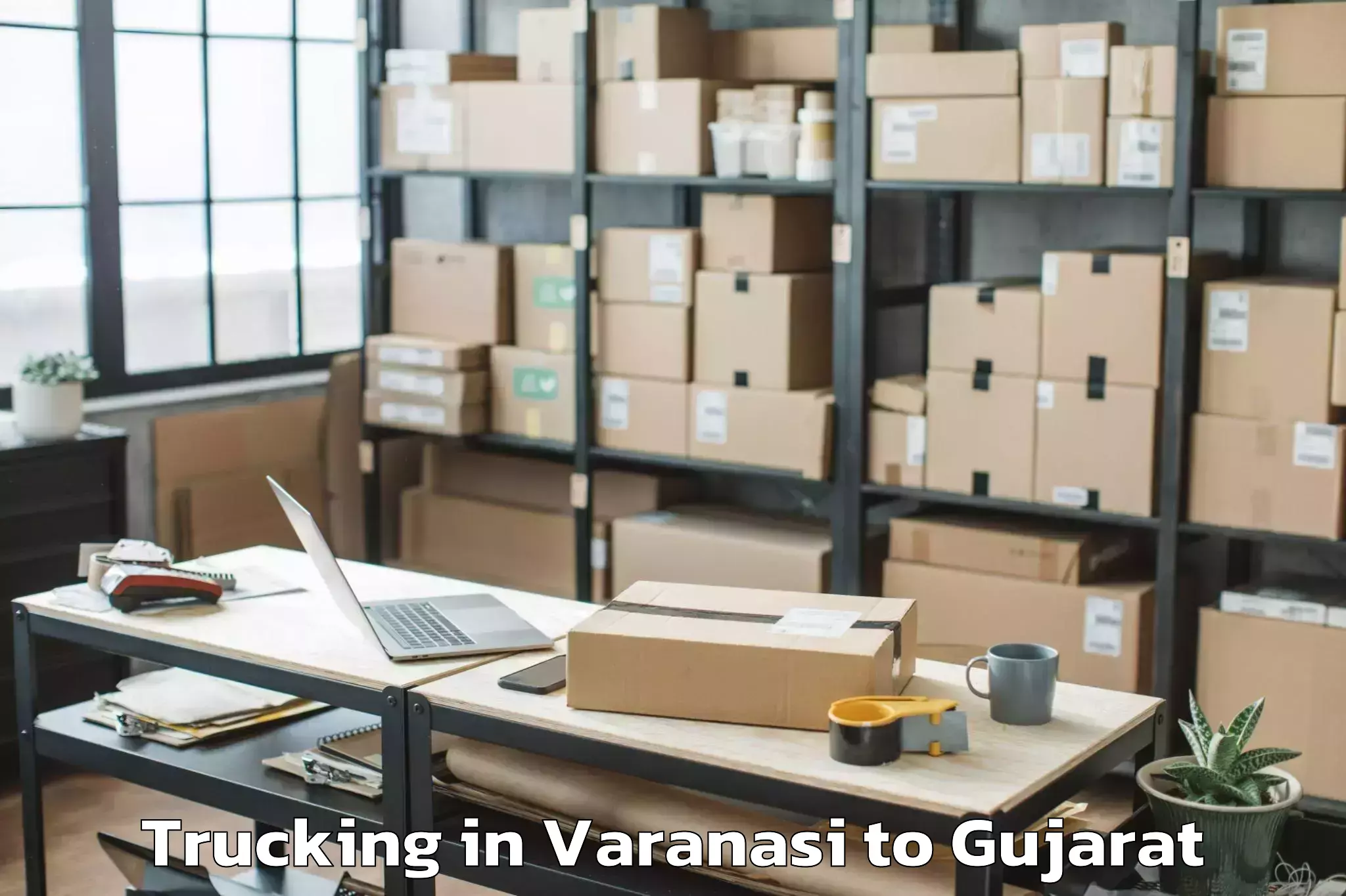 Reliable Varanasi to Rai University Ahmedabad Trucking